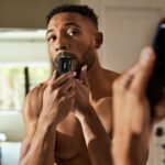 MANSCAPED® The Beard Hedger® Men's Premium Beard Trimmer, 20 Length Adjustable Blade Wheel, Stainless Steel T-Blade for Precision Facial Hair Trimming, Cordless Waterproof Wet/Dry Clipper - Image 9